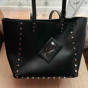 Hot Black Tote purse with silver rivets. Like New by Nine West.